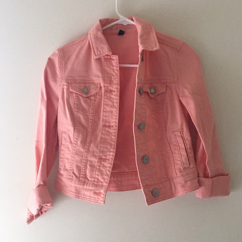 Peach colored denim jacket